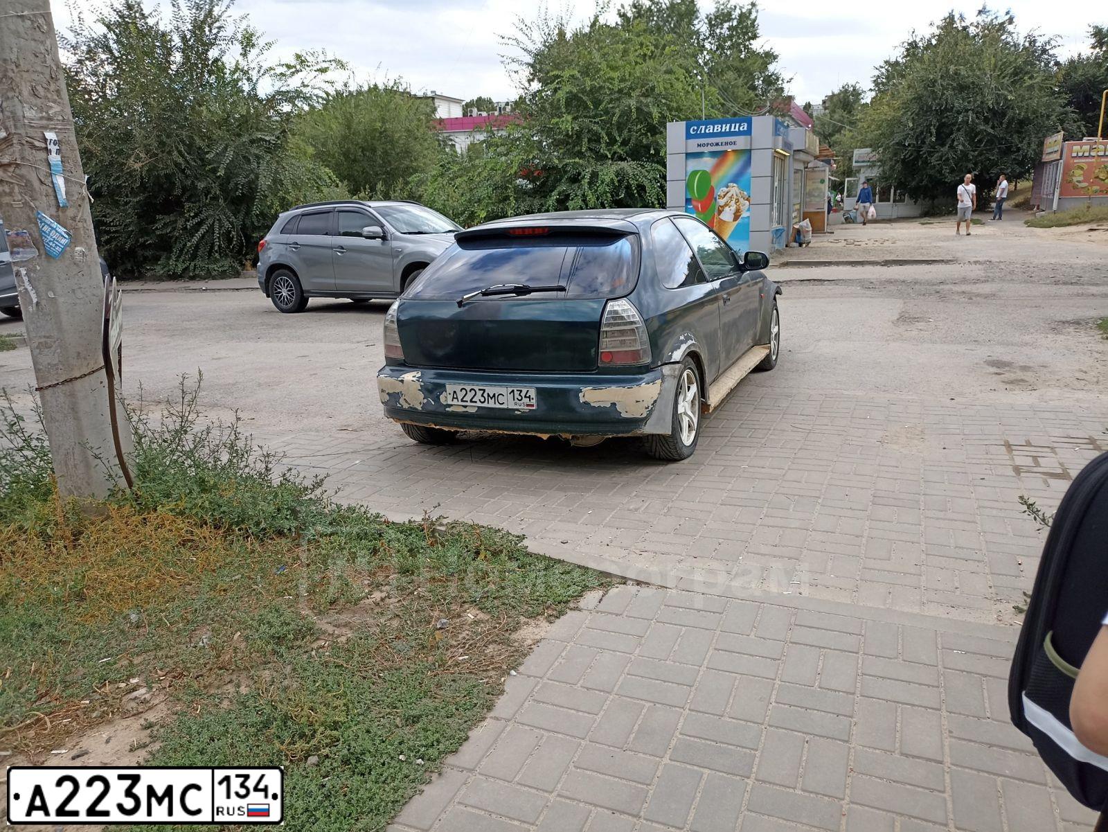 Фото автомобиля HONDA CIVIC, 1998 — госномер А223МС134. Цвет: ЗЕЛЕНЫЙ
