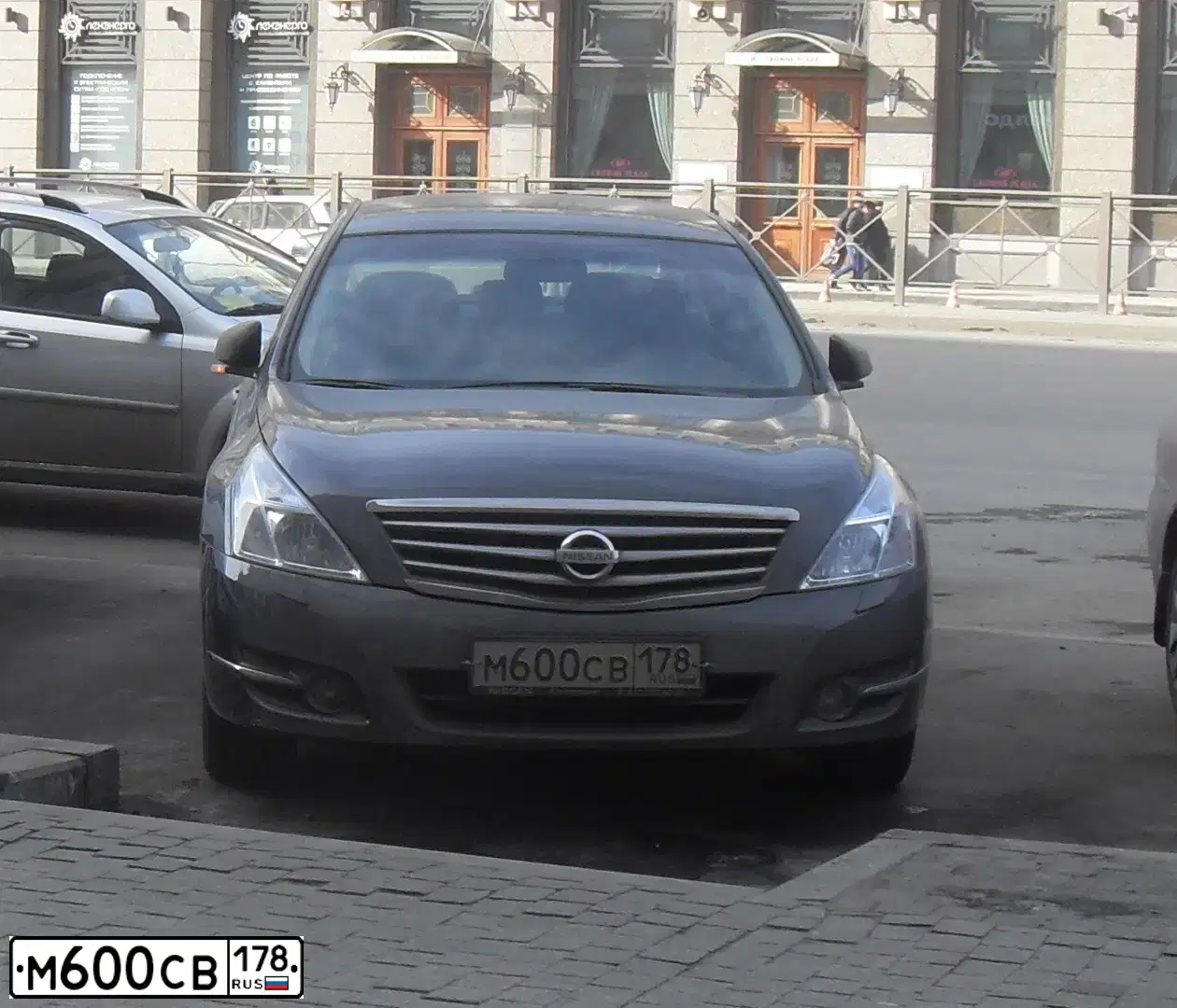 Фото автомобиля NISSAN TEANA, 2009 — госномер Т574КХ138. Цвет: СЕРО-СИРЕНЕВЫЙ