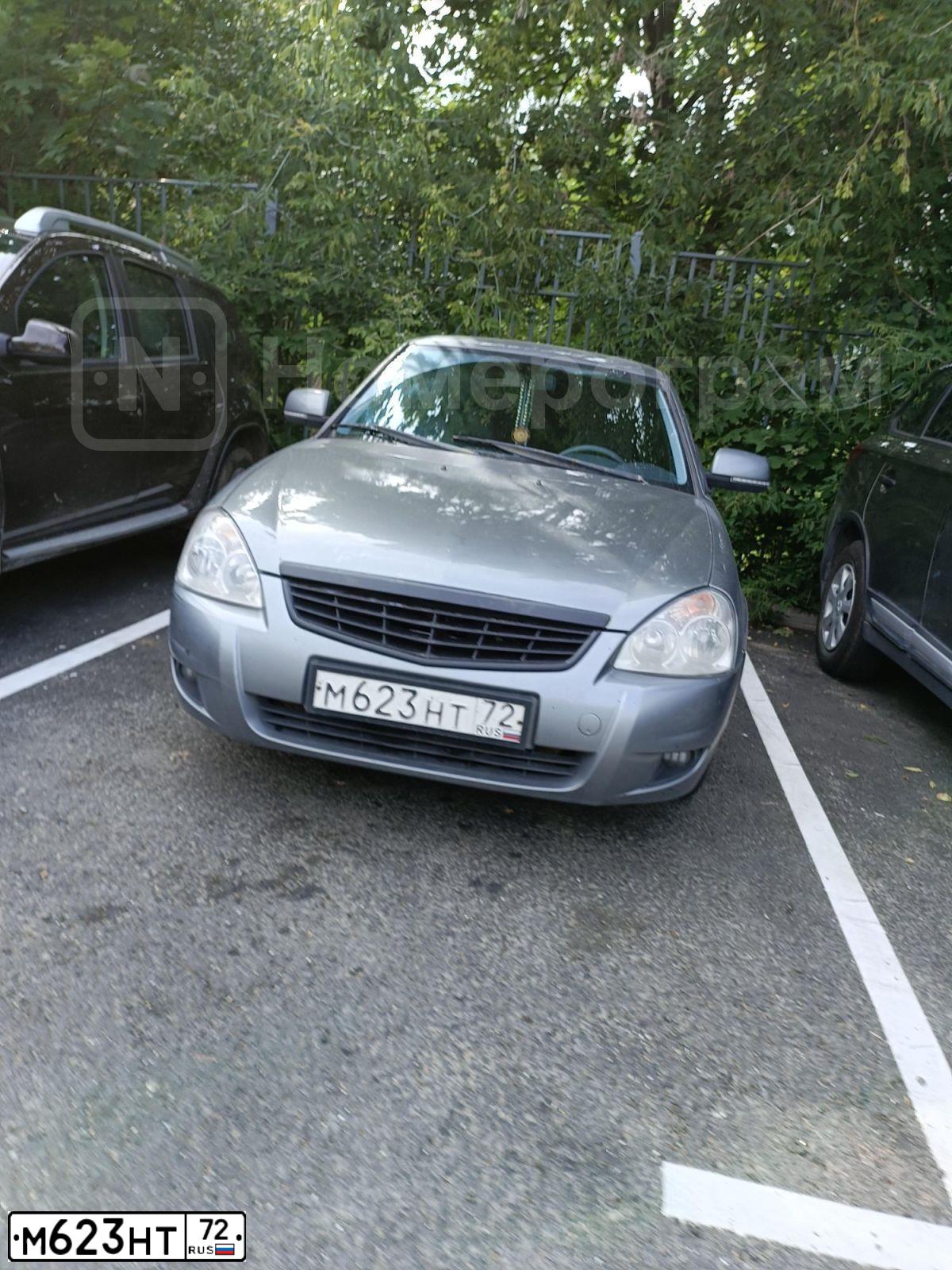 Фото автомобиля LADA 2172 PRIORA, 2010 — госномер М623НТ72. Цвет: СЕРО-ЗЕЛЕНЫЙ