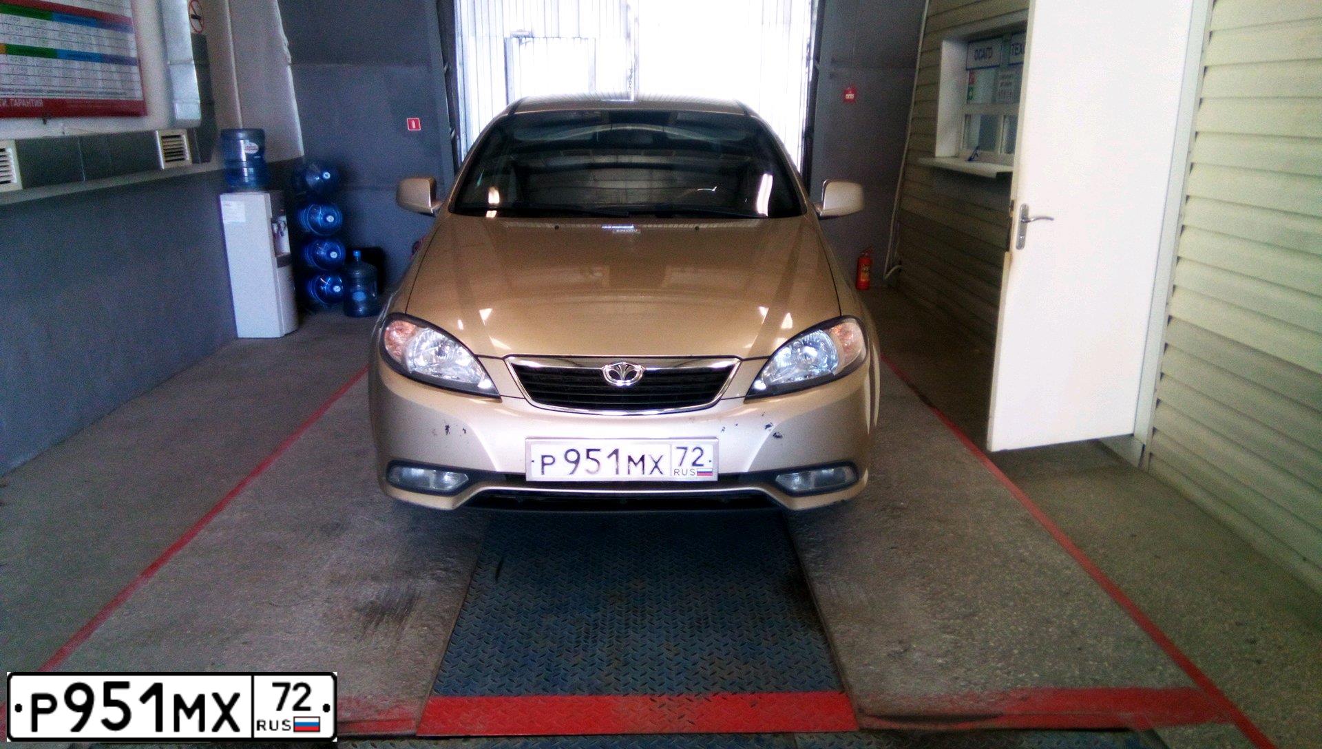 Фото автомобиля DAEWOO GENTRA, 2014 — госномер Р491ВМ154. Цвет: САХАРА