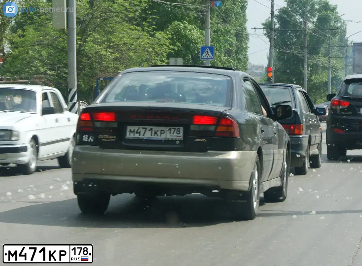 Фото автомобиля SUBARU OUTBACK, 2002 — госномер М471КР178. Цвет: ЧЕРНЫЙ