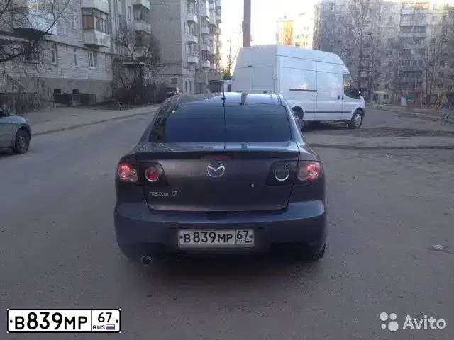 Фото автомобиля MAZDA 3, 2007 — госномер В077АО92. Цвет: Серый