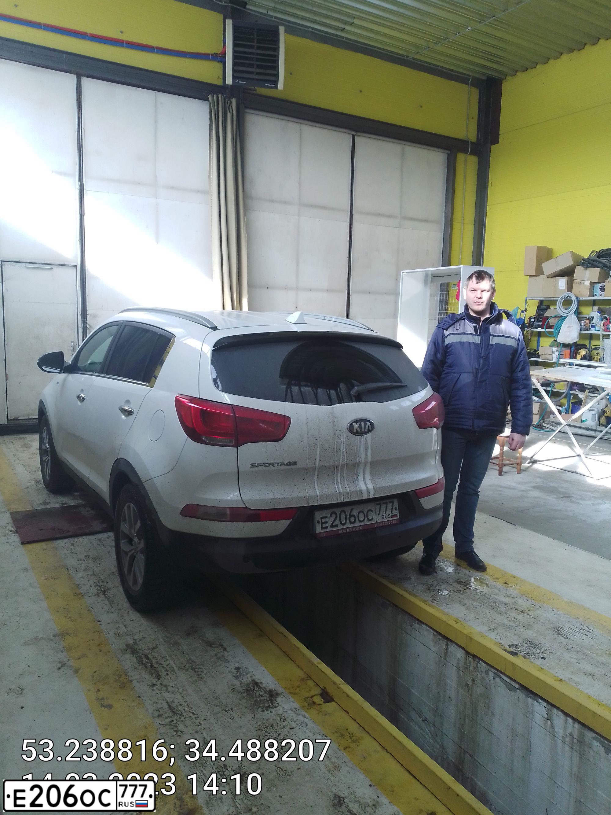Фото автомобиля KIA SPORTAGE, 2015 — госномер О005НА32. Цвет: Белый