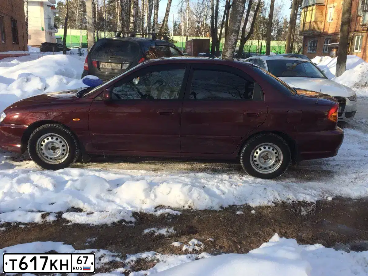 Фото автомобиля SUZUKI LIANA, 2004 — госномер Р965КМ40. Цвет: ЧЕРНЫЙ