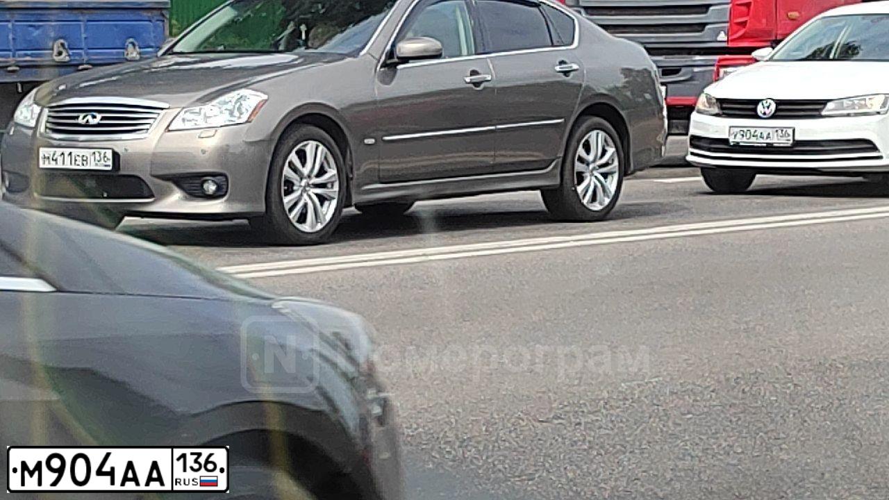 Фото автомобиля SSANGYONG KYRON, 2007 — госномер М904АА136. Цвет: ЧЕРНЫЙ МЕТАЛЛИК