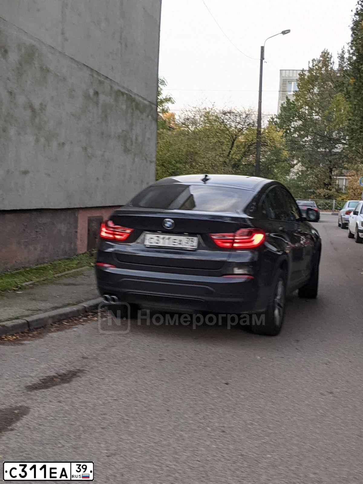 Фото автомобиля BMW X4, 2016 — госномер С311ЕА39. Цвет: ТЕМНО-СЕРЫЙ