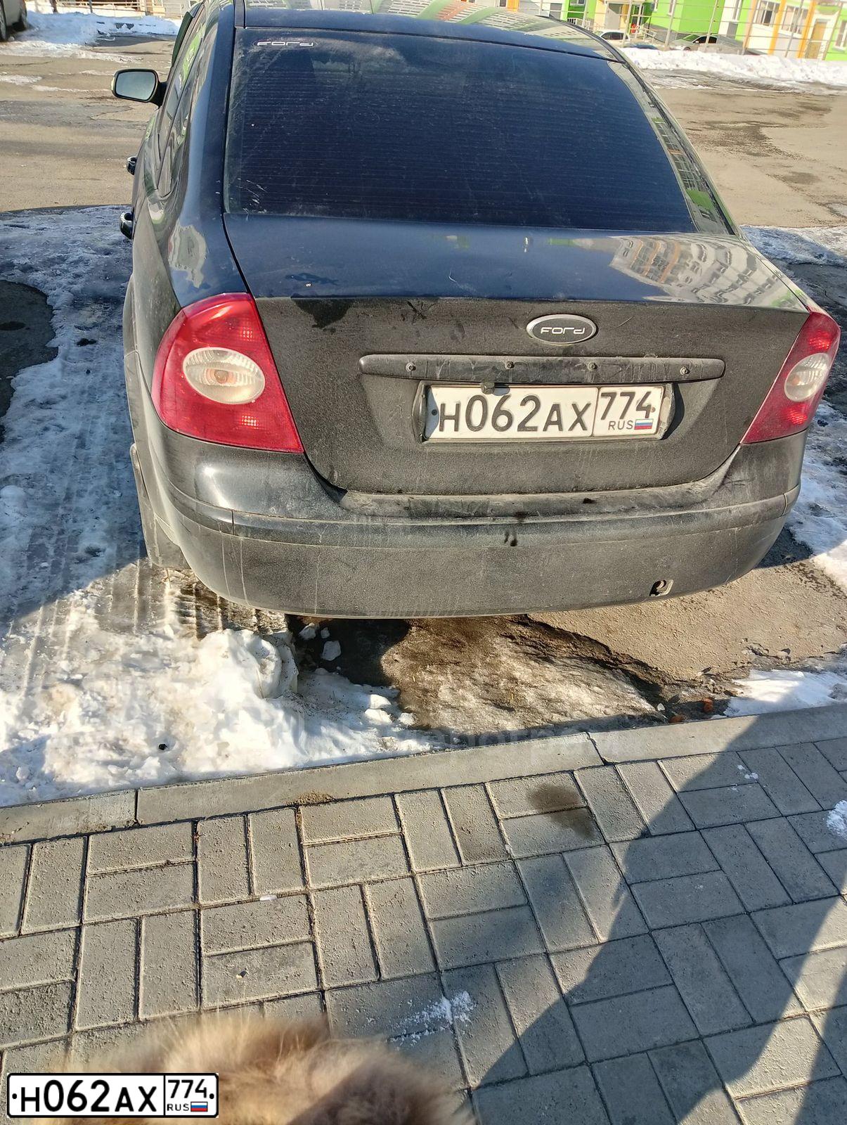 Фото автомобиля FORD FOCUS, 2006 — госномер Н062АХ774. Цвет: ЧЕРНЫЙ