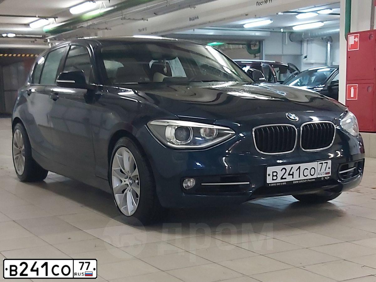 Фото автомобиля BMW SERIE 1, 2012 — госномер К334МК164. Цвет: синий