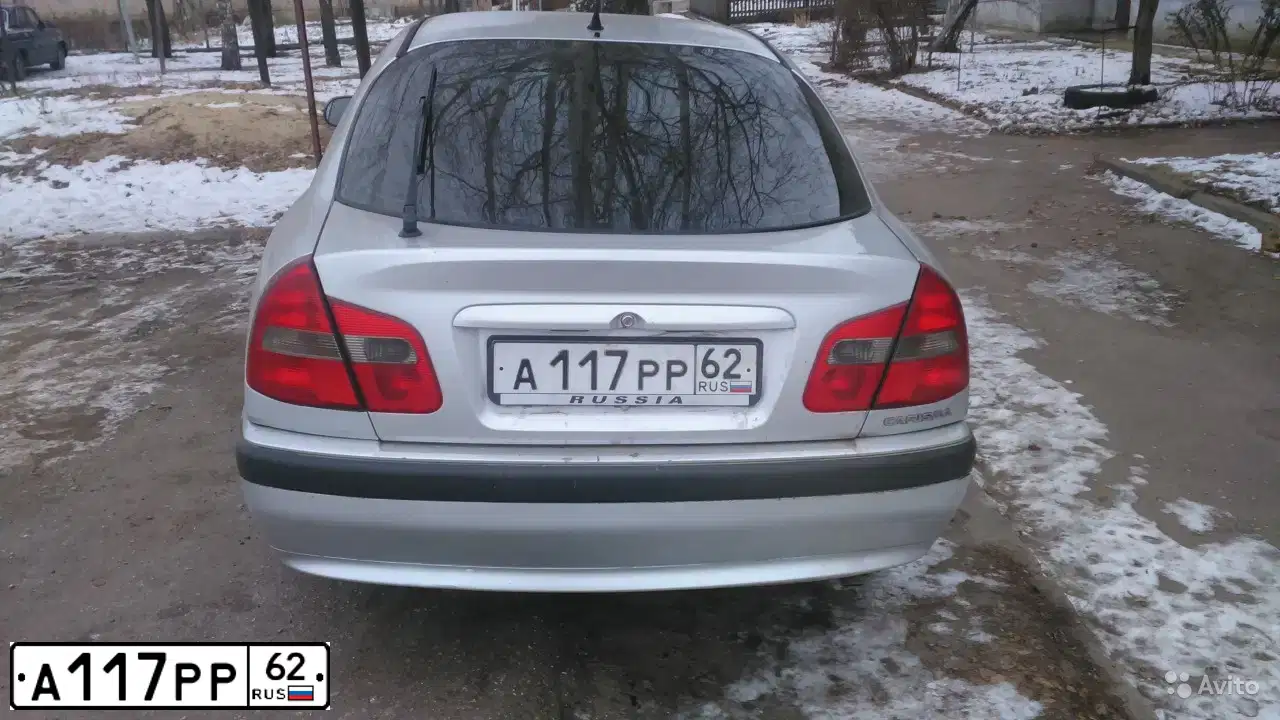 Фото автомобиля MITSUBISHI CARISMA, 2003 — госномер А117РР62. Цвет: СЕРЕБРИСТЫЙ