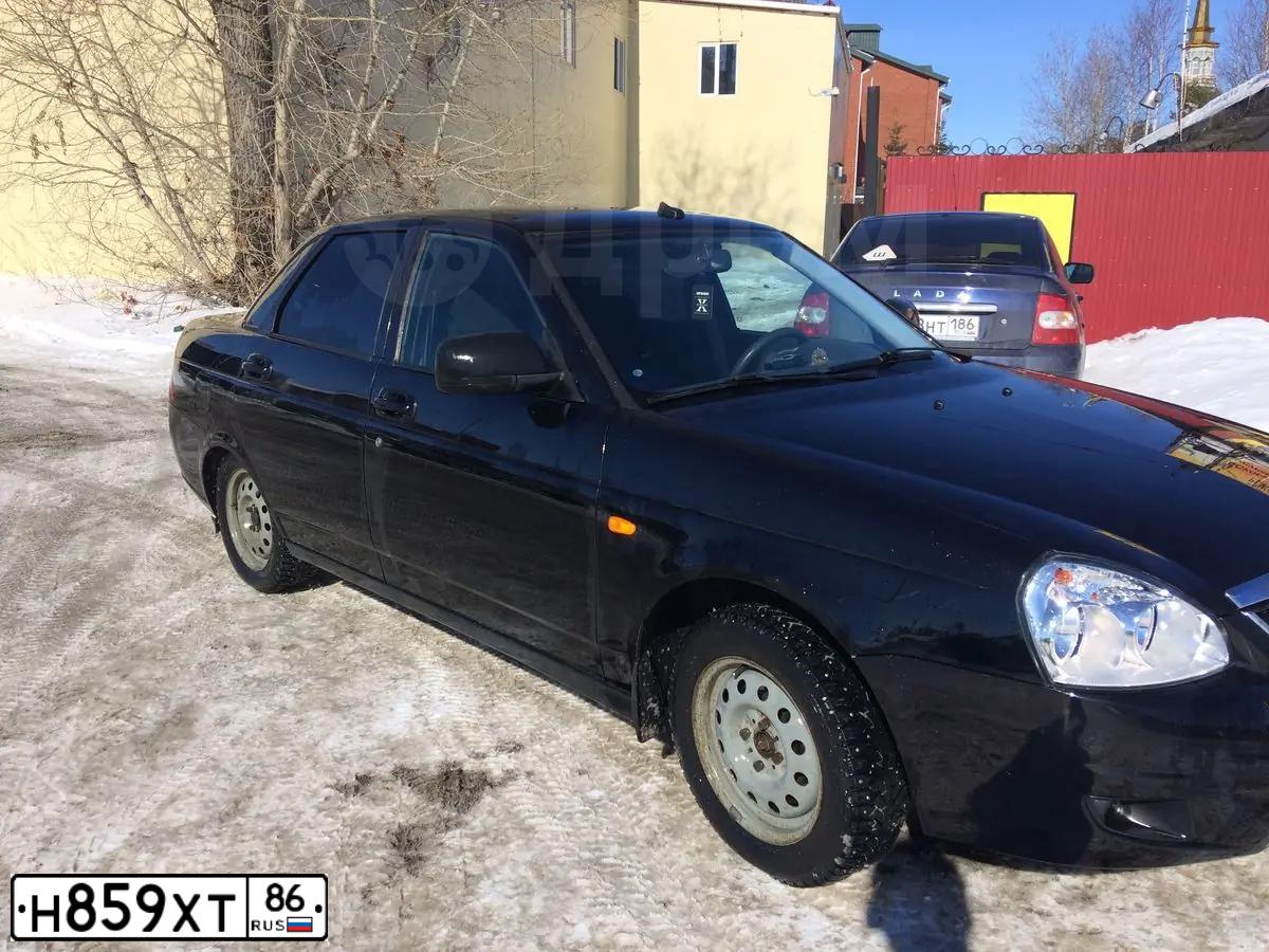 Фото автомобиля LADA PRIORA, 2012 — госномер М580КО186. Цвет: СИНЕ-ЧЕРНЫЙ