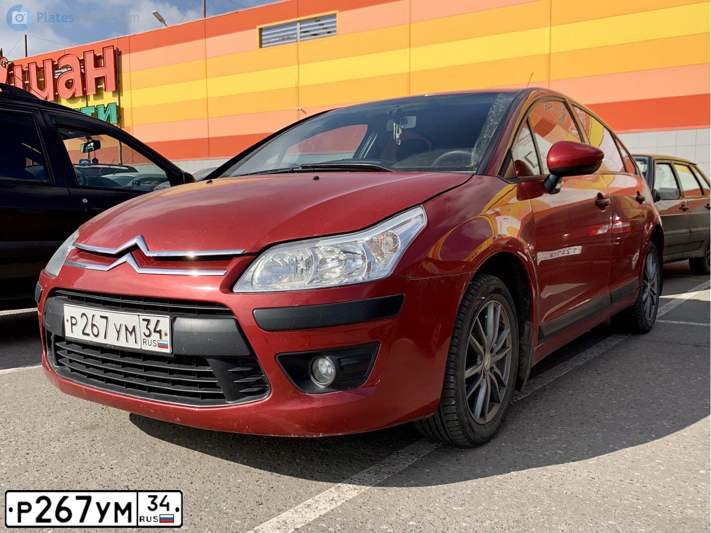 Фото автомобиля CITROEN C4, 2010 — госномер Р267УМ34. Цвет: Красный