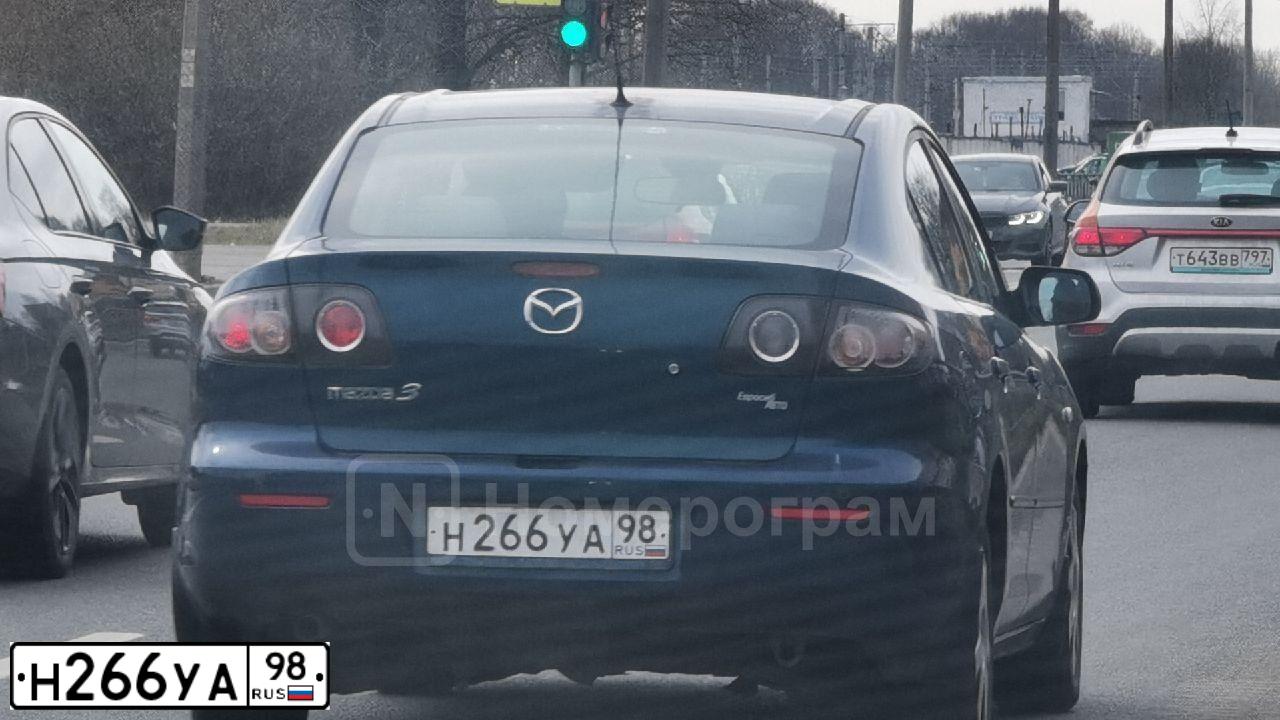 Фото автомобиля MAZDA 3, 2007 — госномер Н266УА98. Цвет: СИНЕ-ЗЕЛЕНЫЙ