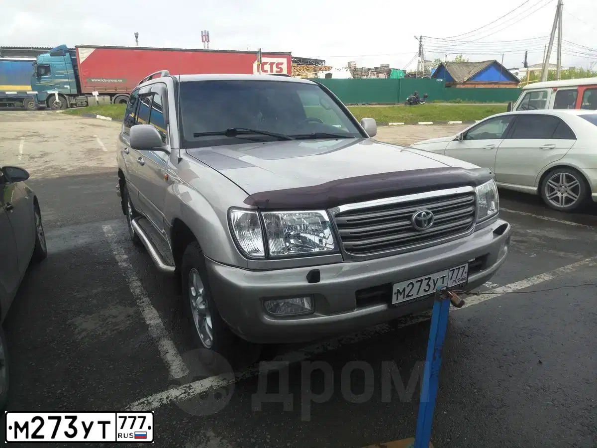 Фото автомобиля TOYOTA LANDCRUISER, 2003 — госномер Н549НН99. Цвет: Серебристый