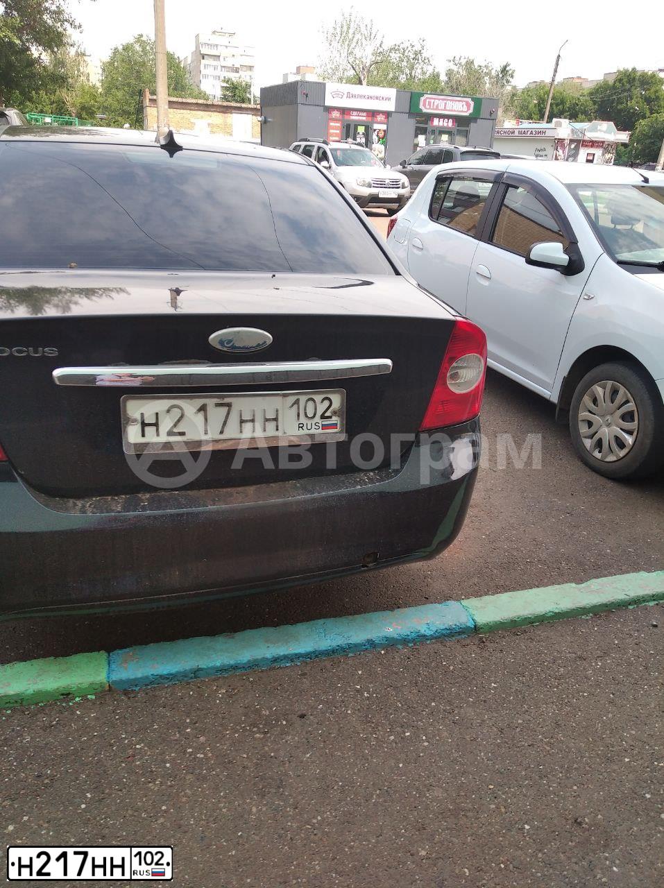 Фото автомобиля FORD FOCUS, 2008 — госномер Н217НН102. Цвет: ЧЕРНЫЙ