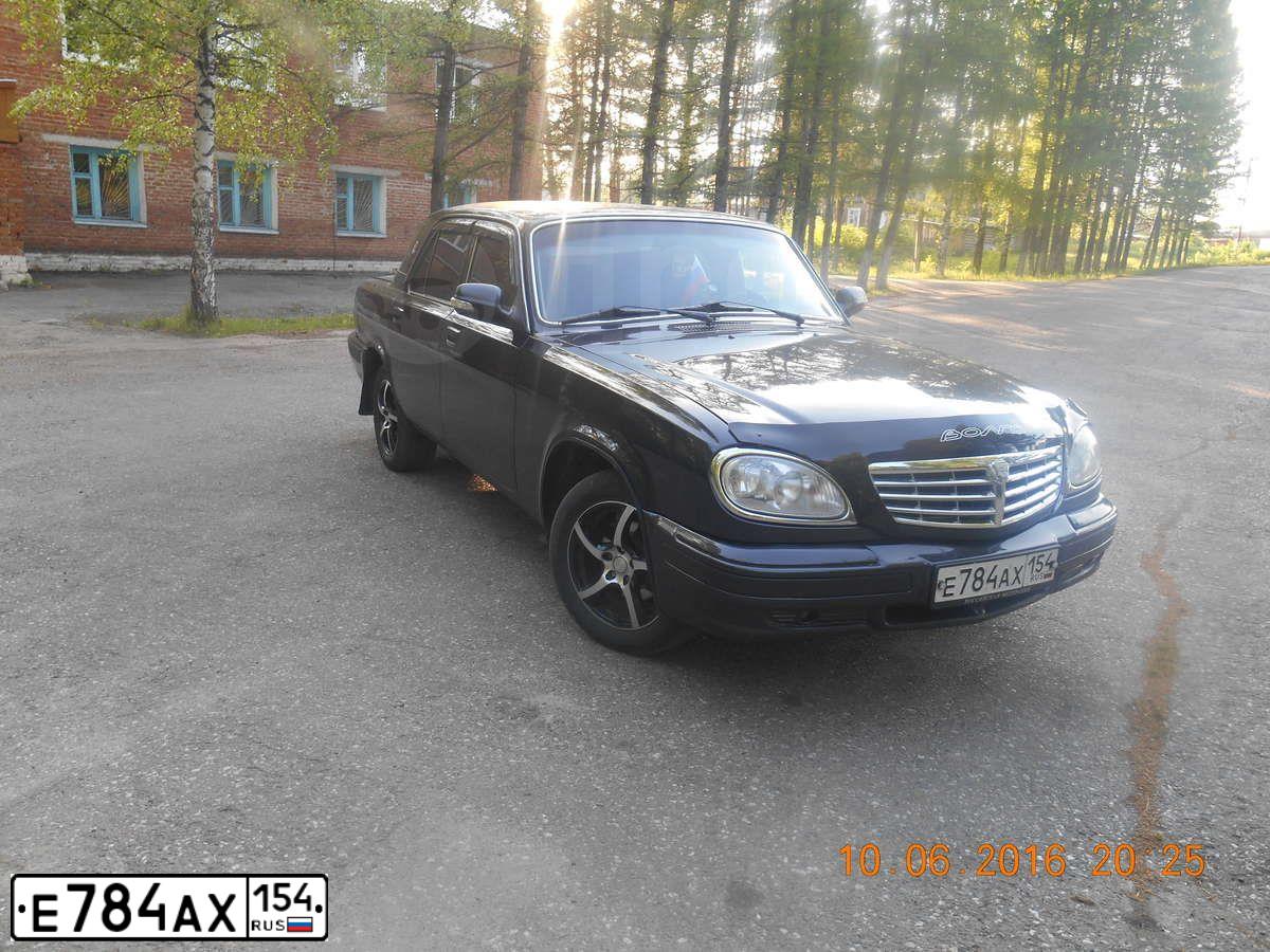 Фото автомобиля GAZ 3110 WOLGA, 2008 — госномер Е784АХ154. Цвет: ЧЕРНО-СИНИЙ