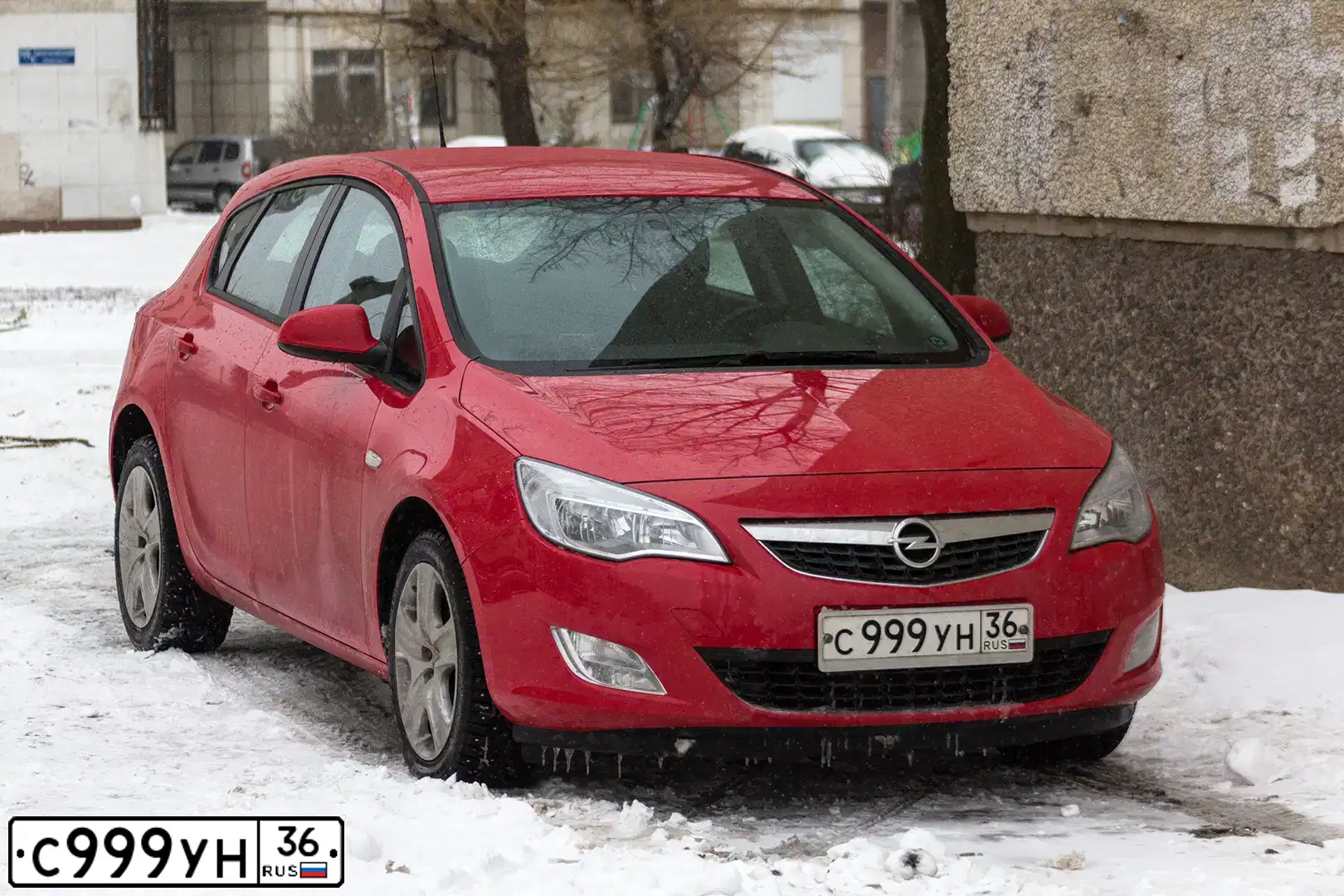Фото автомобиля OPEL ASTRA, 2012 — госномер О753СМ68. Цвет: Красный