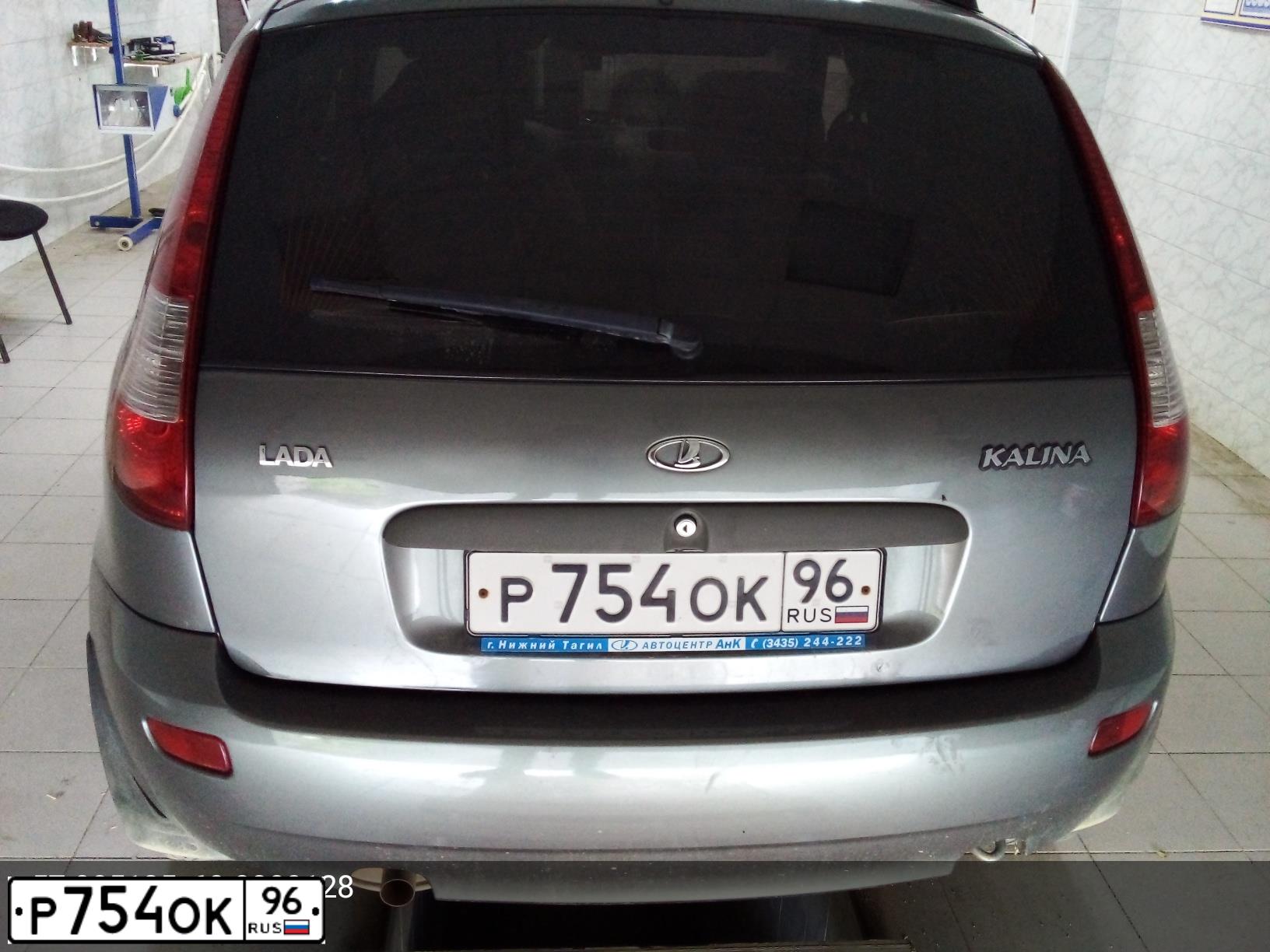Фото автомобиля LADA 1119 KALINA, 2010 — госномер Р754ОК96. Цвет: ТЕМНО-СЕРЫЙ