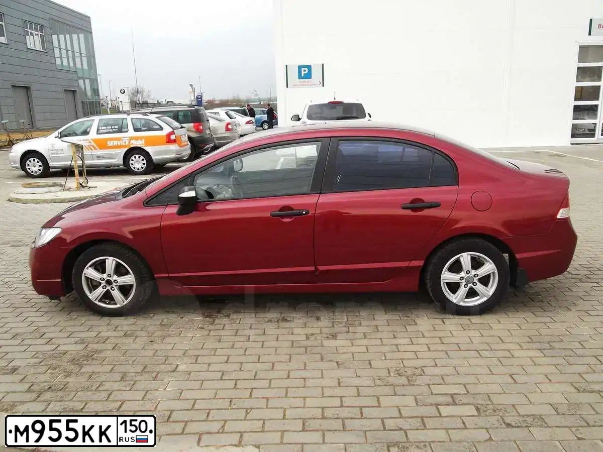 Фото автомобиля KIA SPECTRA, 2007 — госномер М955КК150. Цвет: КРАСНЫЙ ПЕРЕЦ