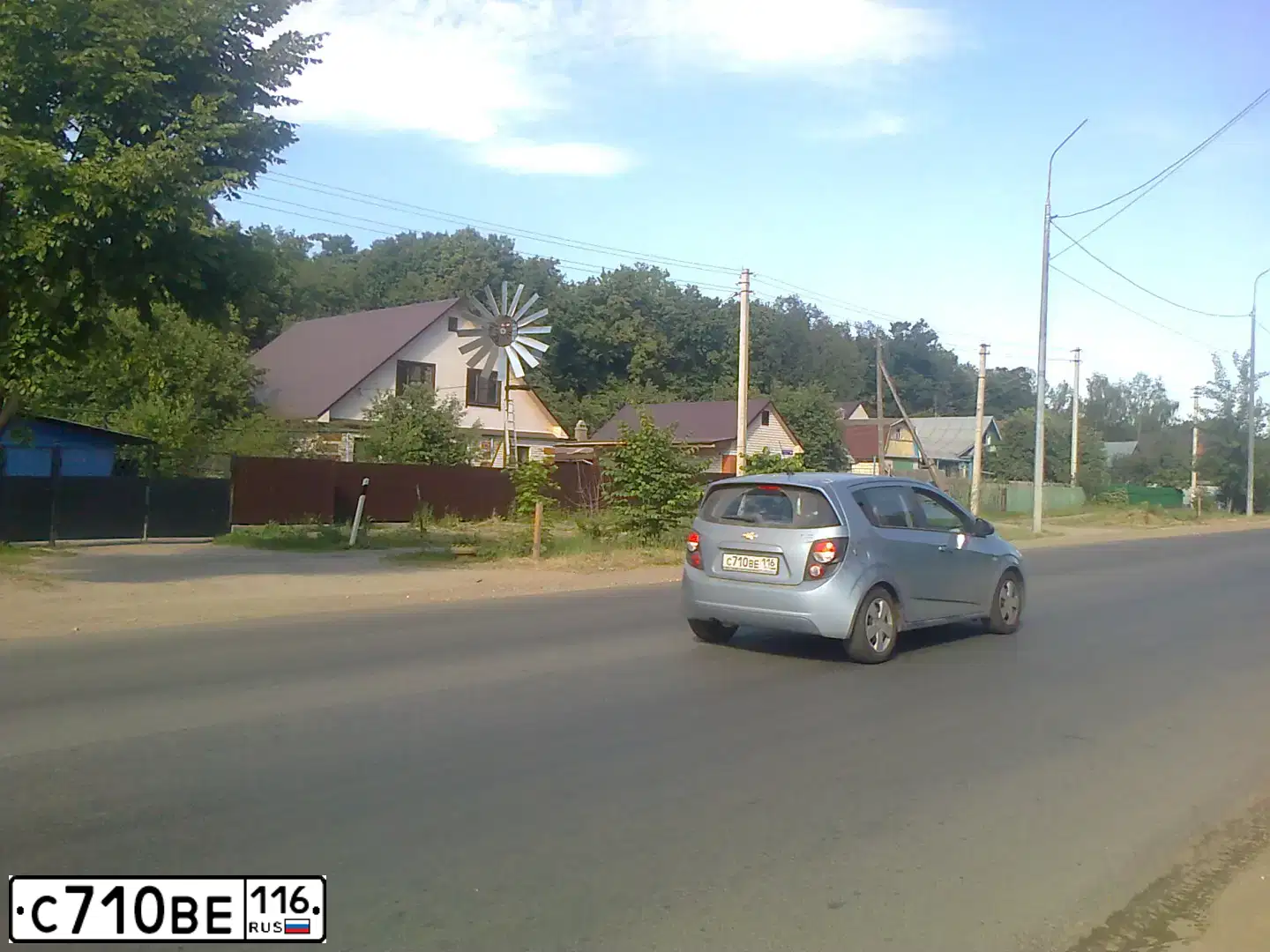 Фото автомобиля CHEVROLET AVEO, 2012 — госномер С710ВЕ116. Цвет: ГОЛУБОЙ