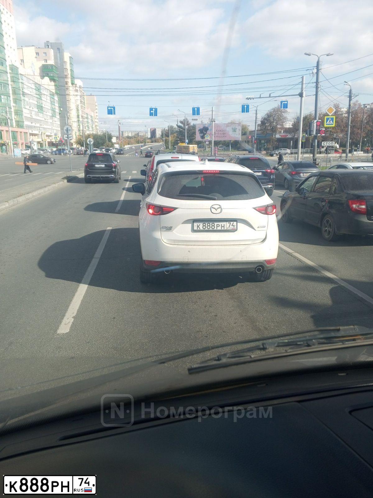 Фото автомобиля LADA 2110, 2002 — госномер М111АХ74. Цвет: Темно-зеленый