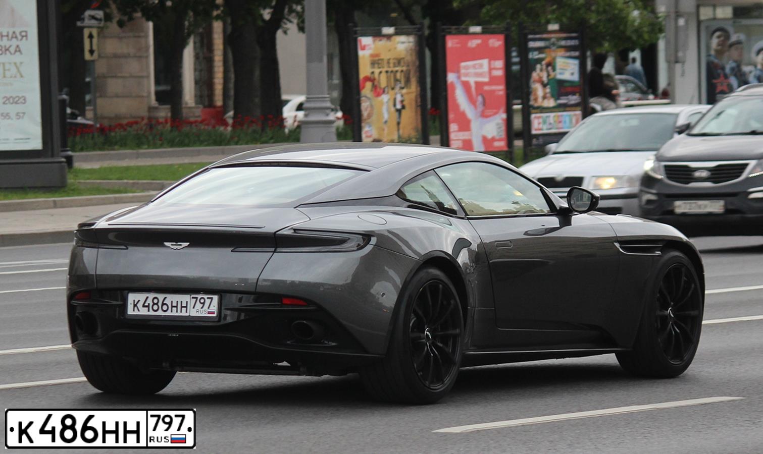 Фото автомобиля ASTON MARTIN DB11, 2019 — госномер Е823АА550. Цвет: СЕРЫЙ