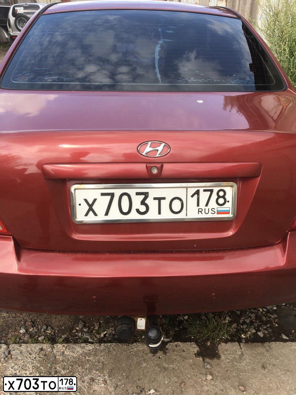 Фото автомобиля HYUNDAI I ELANTRA, 2003 — госномер Х703ТО178. Цвет: ВИШНЕВЫЙ