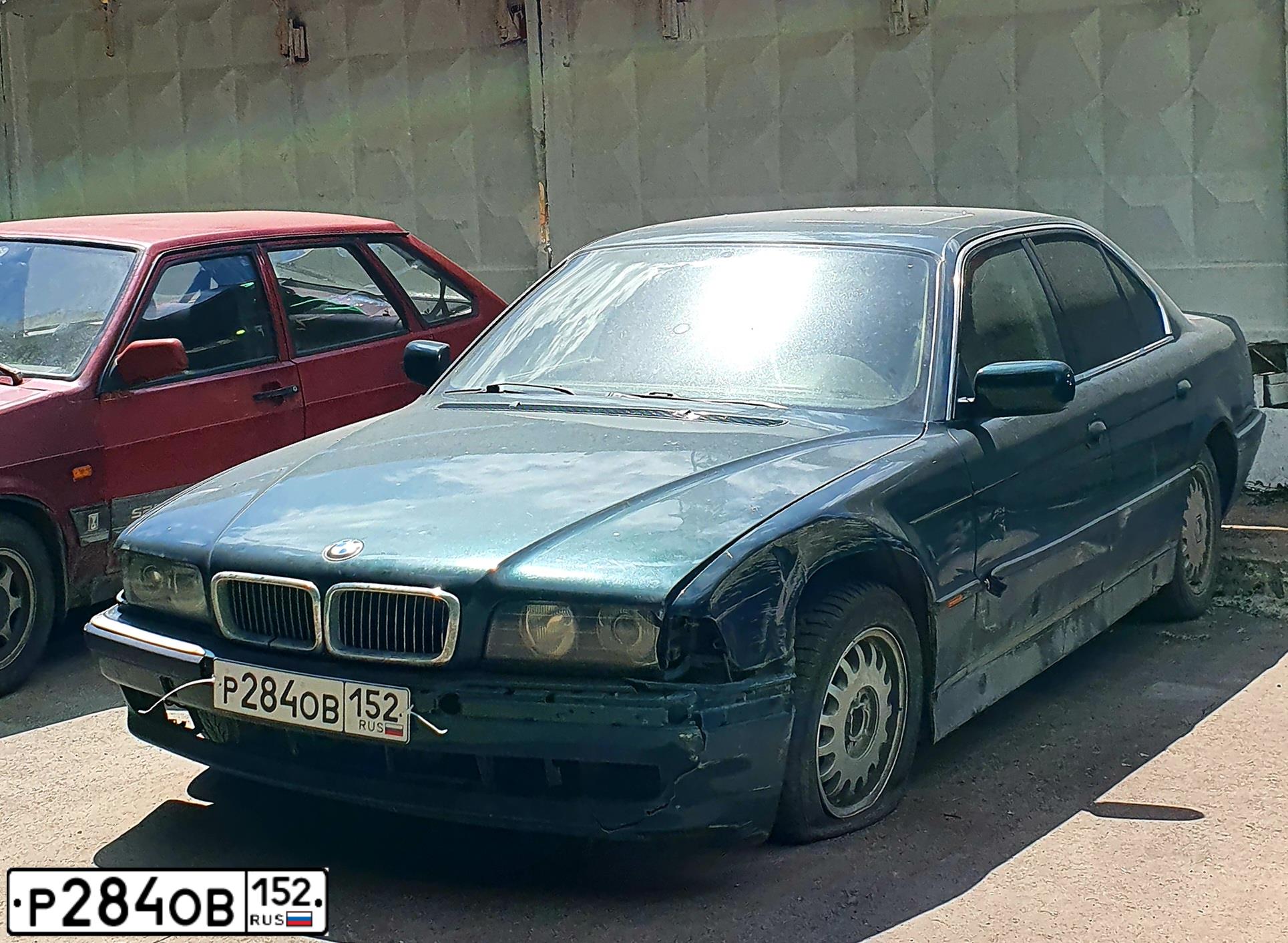 Фото автомобиля BMW SERIE 7, 1995 — госномер Р284ОВ152. Цвет: ЗЕЛЕНЫЙ