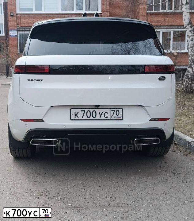 Фото автомобиля VOLKSWAGEN TOUAREG, 2019 — госномер К700УС70. Цвет: Коричневый