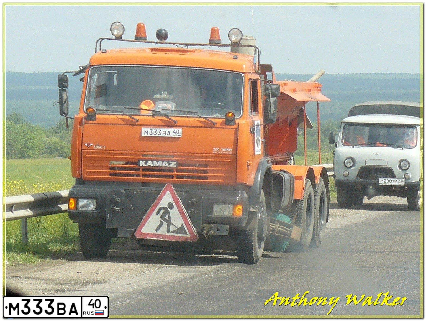 Фото автомобиля KAMAZ 65115 /6X4/, 2009 — госномер М333ВА40. Цвет: Оранжевый