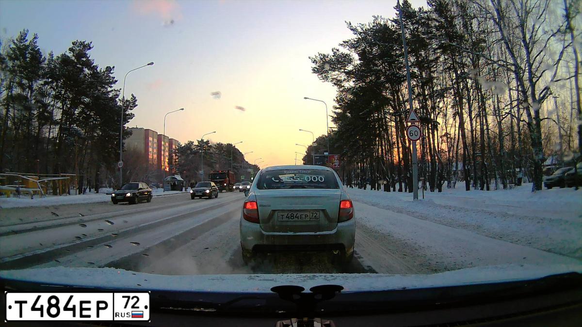 Фото автомобиля LADA 2190 GRANTA, 2019 — госномер Т484ЕР72. Цвет: БЕЛЫЙ