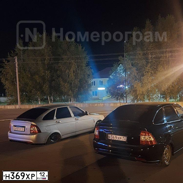 Фото автомобиля LADA 2172 PRIORA, 2012 — госномер Н369ХР12. Цвет: СИНЕ-ЧЕРНЫЙ