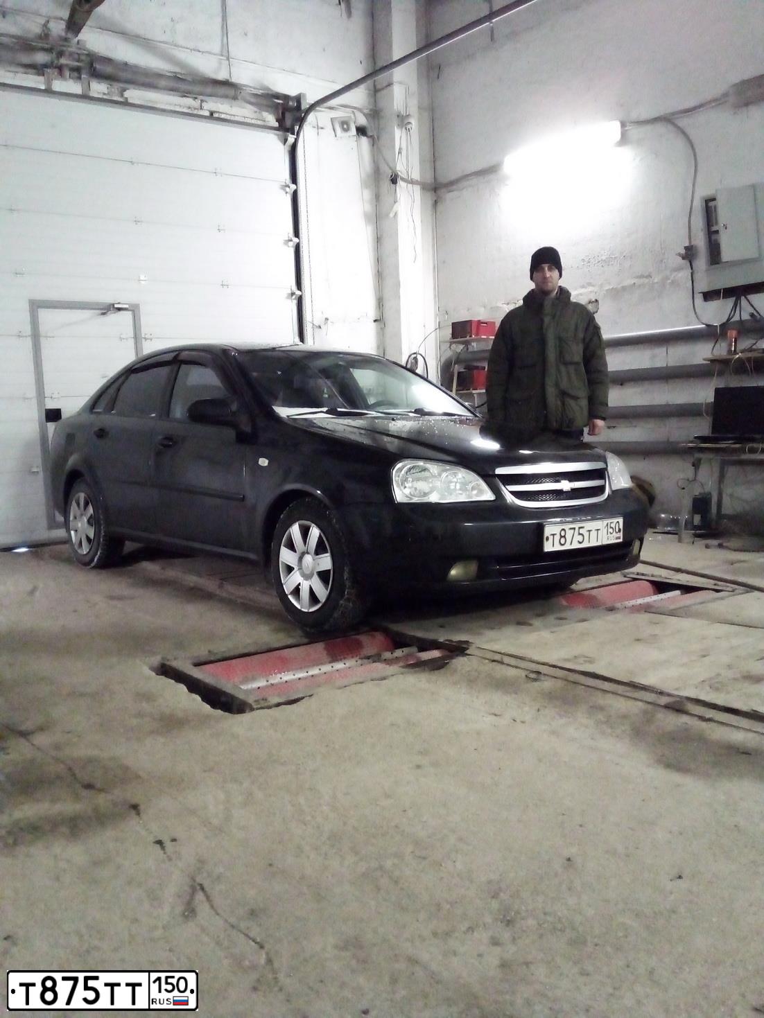 Фото автомобиля CHEVROLET LACETTI, 2008 — госномер Т875ТТ150. Цвет: ЧЕРНЫЙ