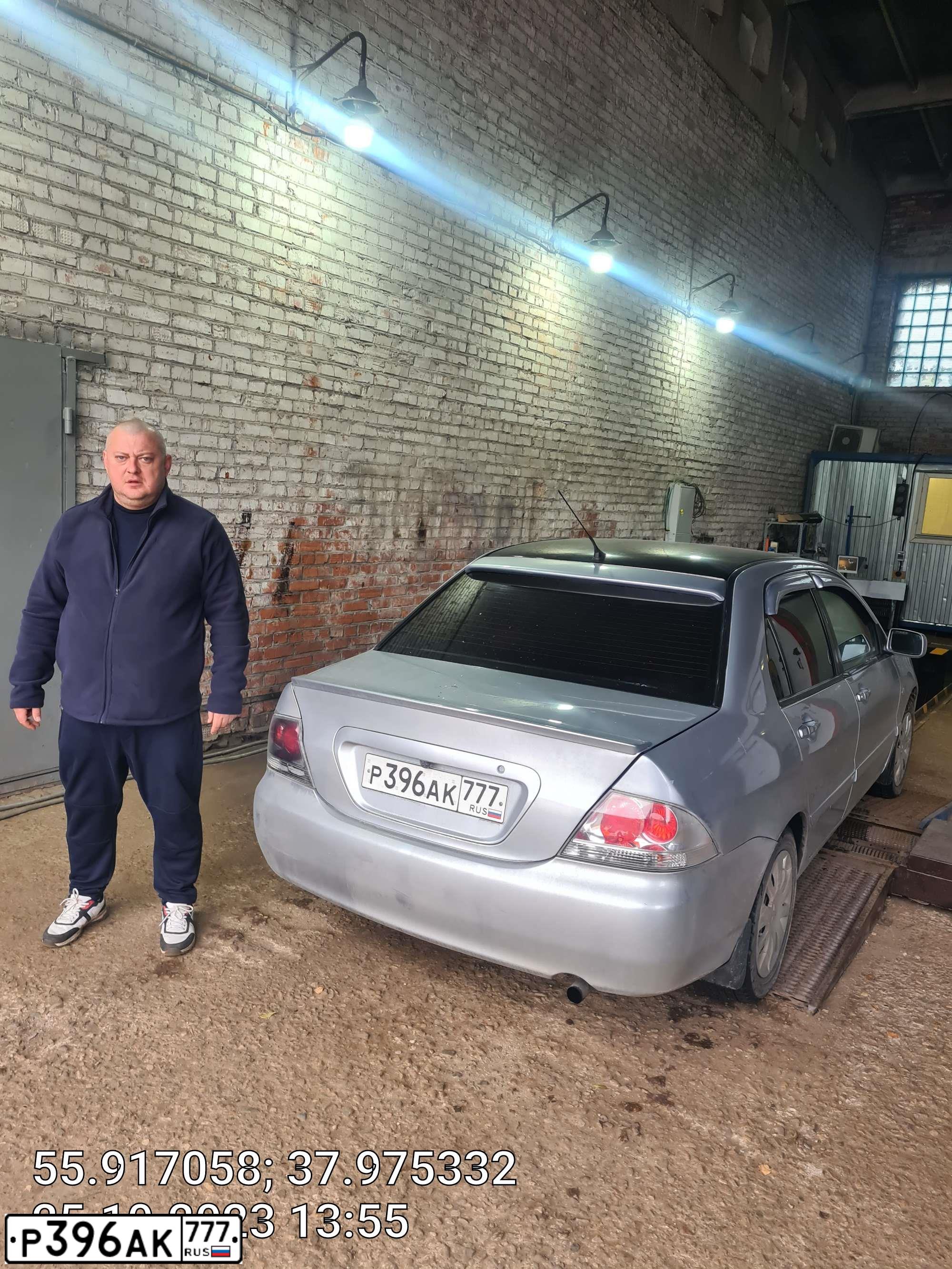 Фото автомобиля MITSUBISHI LANCER, 2005 — госномер Р396АК777. Цвет: Серебристый