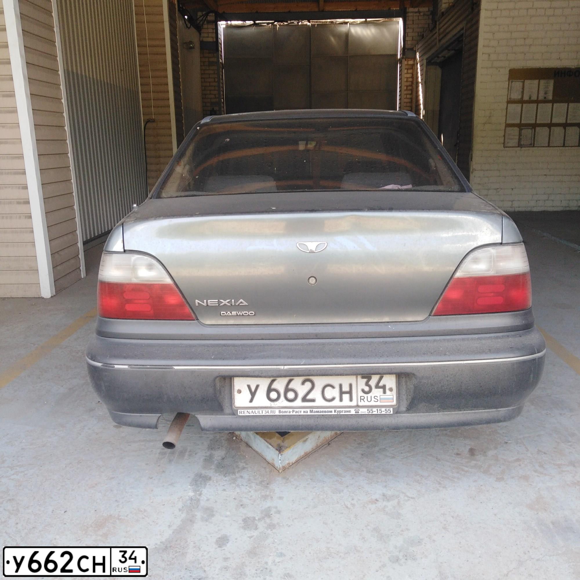 Фото автомобиля DAEWOO O NEXIA, 1999 — госномер Х814РХ55. Цвет: СВЕТЛО-ЗЕЛЕНЫЙ
