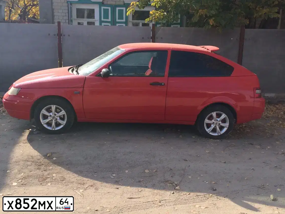 Фото автомобиля LADA 2112, 2002 — госномер Т452ЕА58. Цвет: СЕРЕБРИСТЫЙ ЯРКО-СИНИЙ