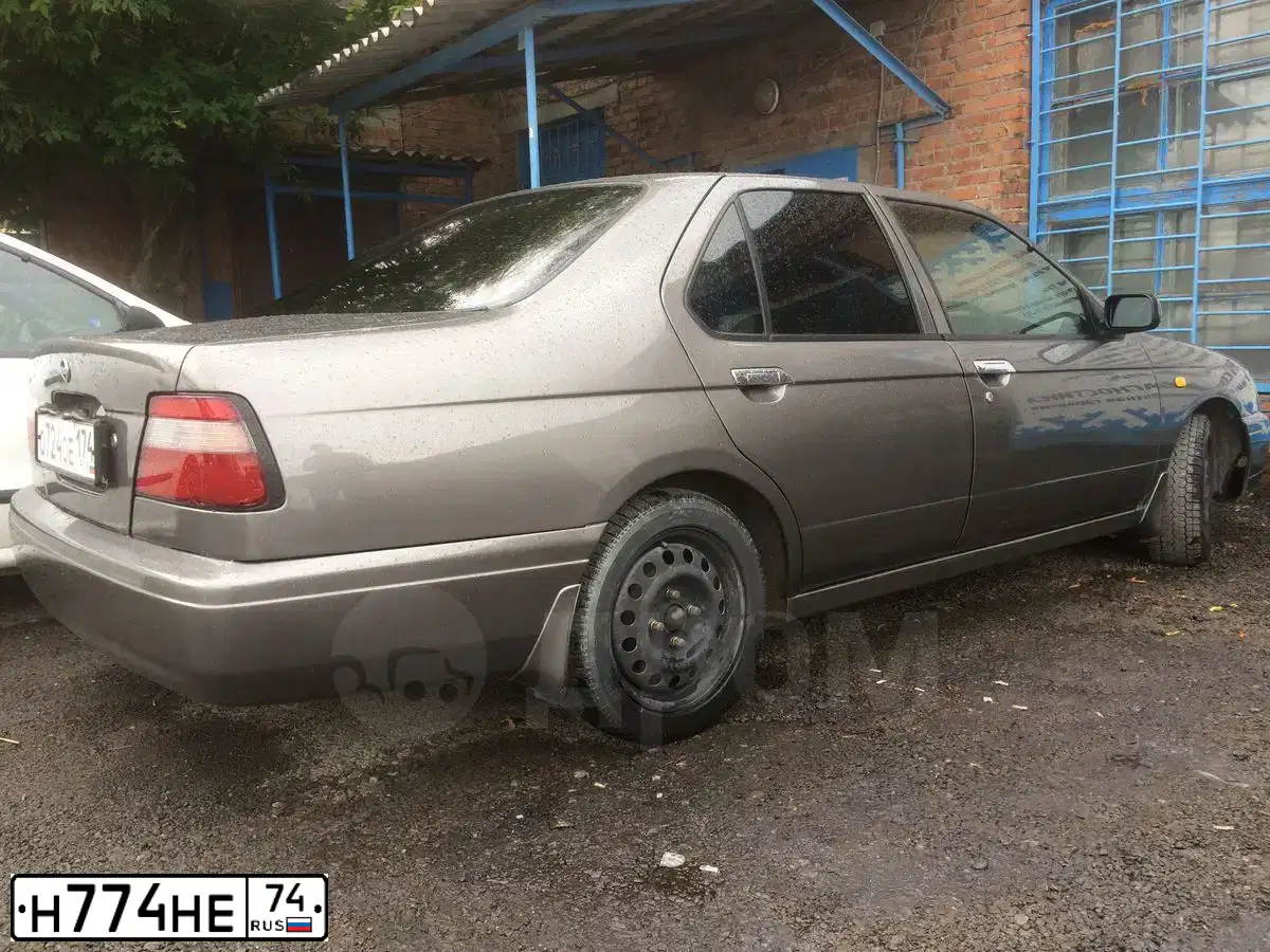 Фото автомобиля AZLK MOSKWITSCH 2141, 1993 — госномер Н774НЕ74. Цвет: БЕЛЫЙ