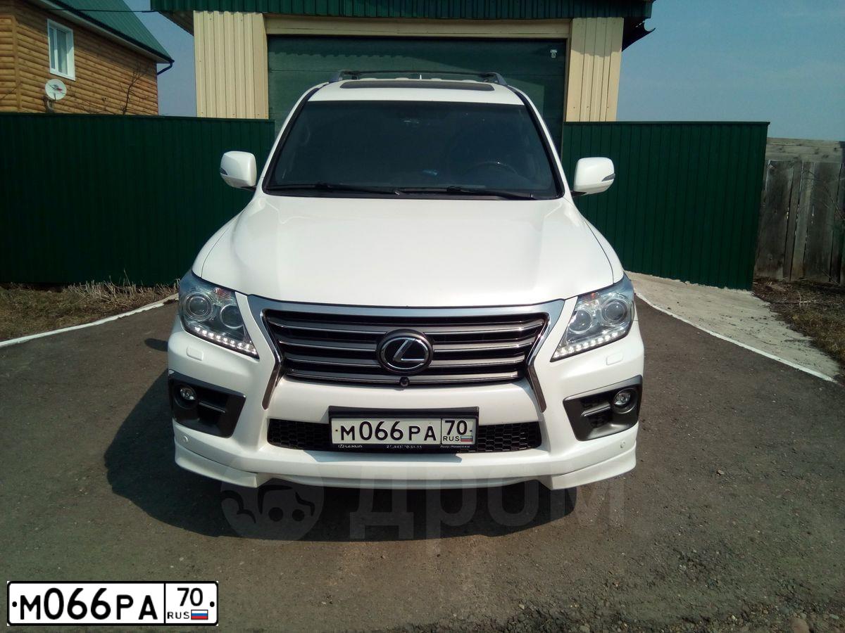 Фото автомобиля TOYOTA LANDCRUISER, 2005 — госномер К207КР70. Цвет: ТЕМНО-СЕРЫЙ