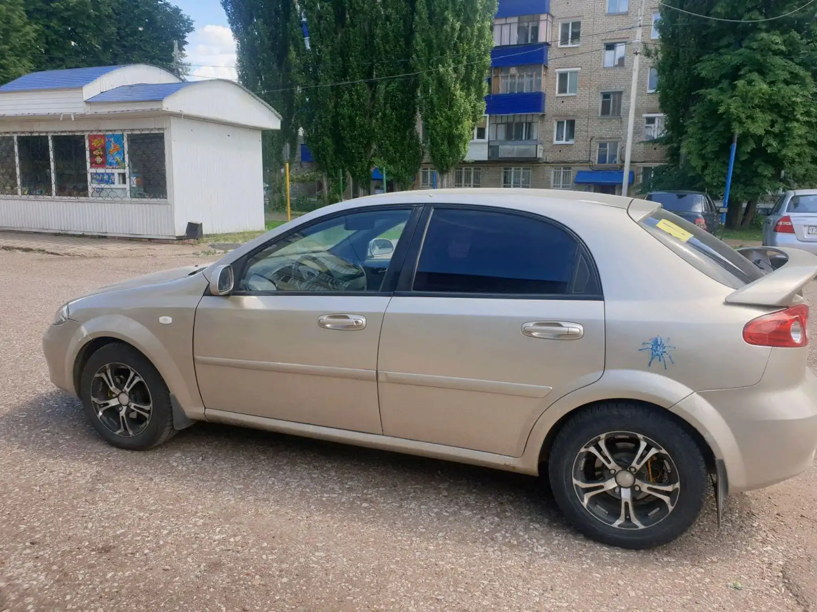Фото автомобиля CHEVROLET LACETTI, 2007 — госномер У361МК102. Цвет: БЕЖЕВЫЙ