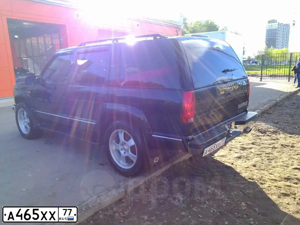 Фото автомобиля CHEVROLET TAHOE, 1998 — госномер К564НО53. Цвет: ЧЕРНЫЙ