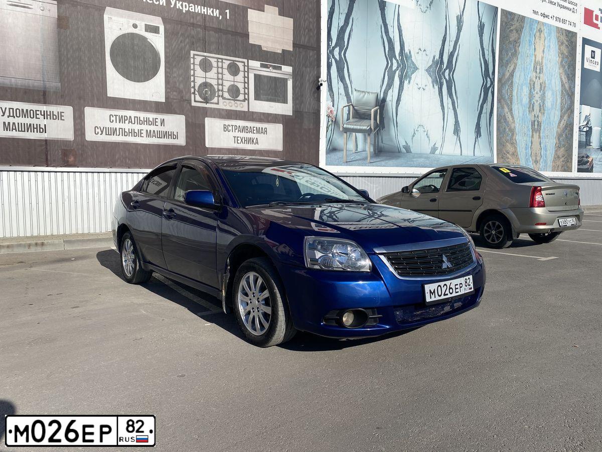 Фото автомобиля MITSUBISHI GALANT, 2008 — госномер М026ЕР82. Цвет: синий