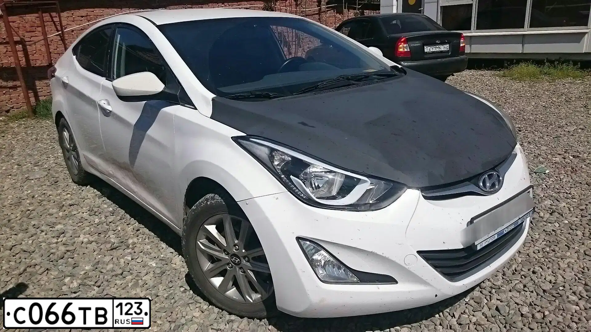 Фото автомобиля HYUNDAI ELANTRA, 2014 — госномер С066ТВ123. Цвет: Белый