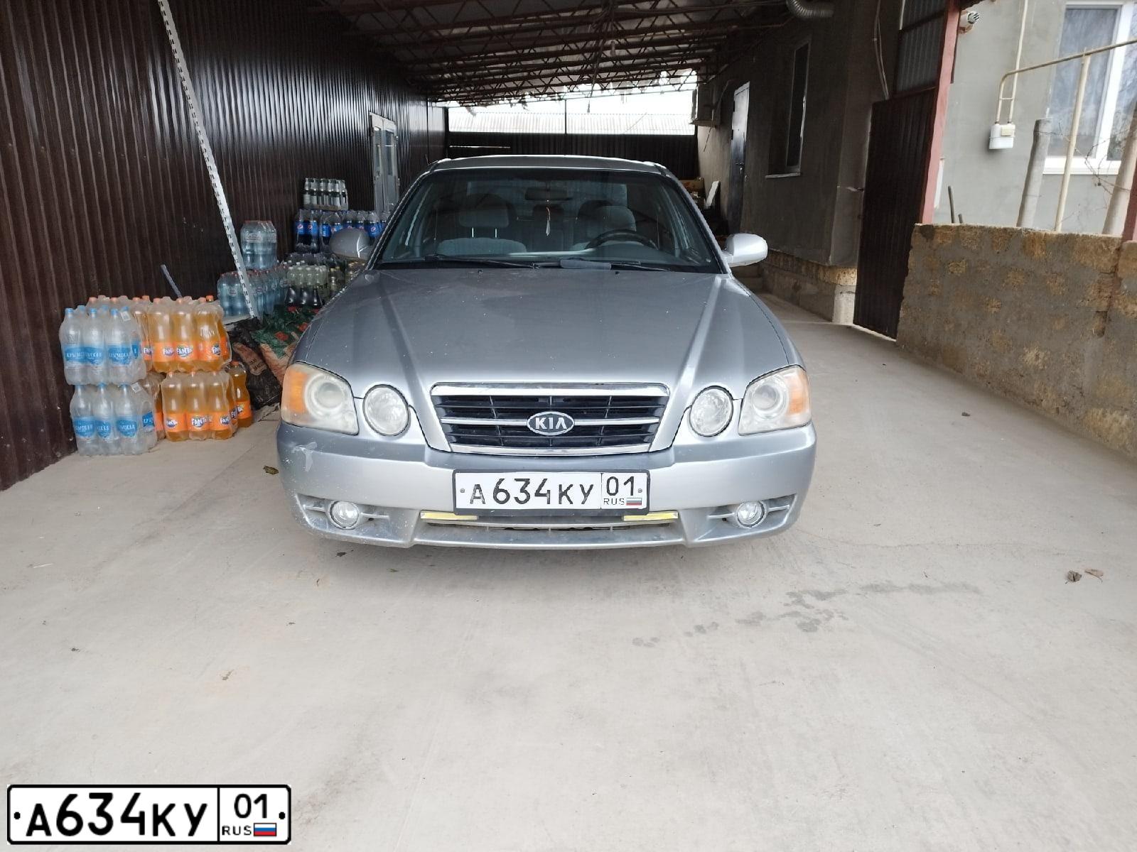 Фото автомобиля KIA MAGENTIS, 2004 — госномер Н667НС82. Цвет: СЕРЕБРИСТЫЙ