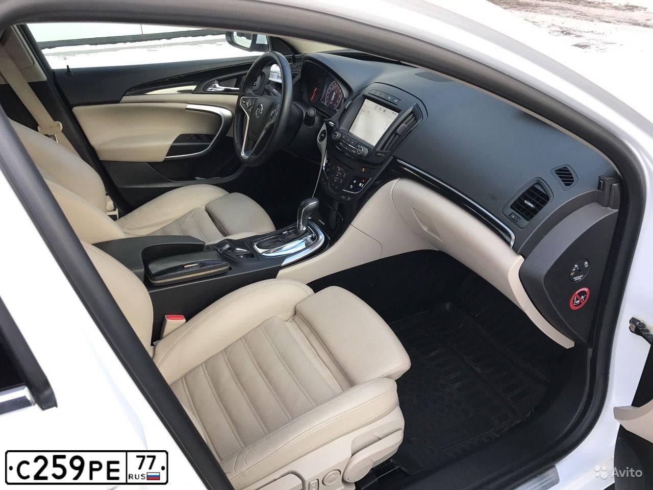 Фото автомобиля ОПЕЛЬ 0G-A (INSIGNIA LIMOUSINE HB), 2013 — госномер Р087ХС40. Цвет: Белый черный 