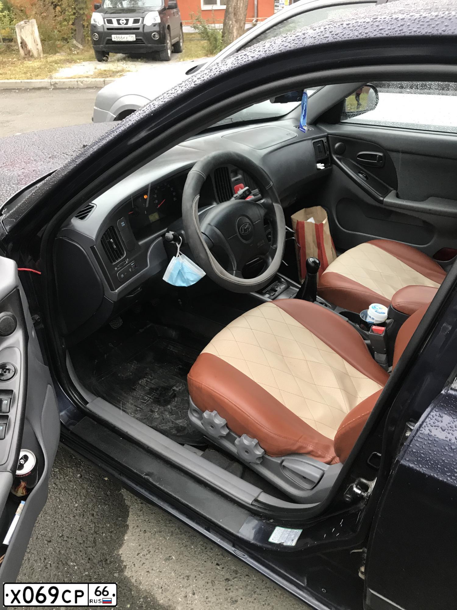Фото автомобиля HYUNDAI I ELANTRA, 2005 — госномер Х594УУ72. Цвет: Темно-синий