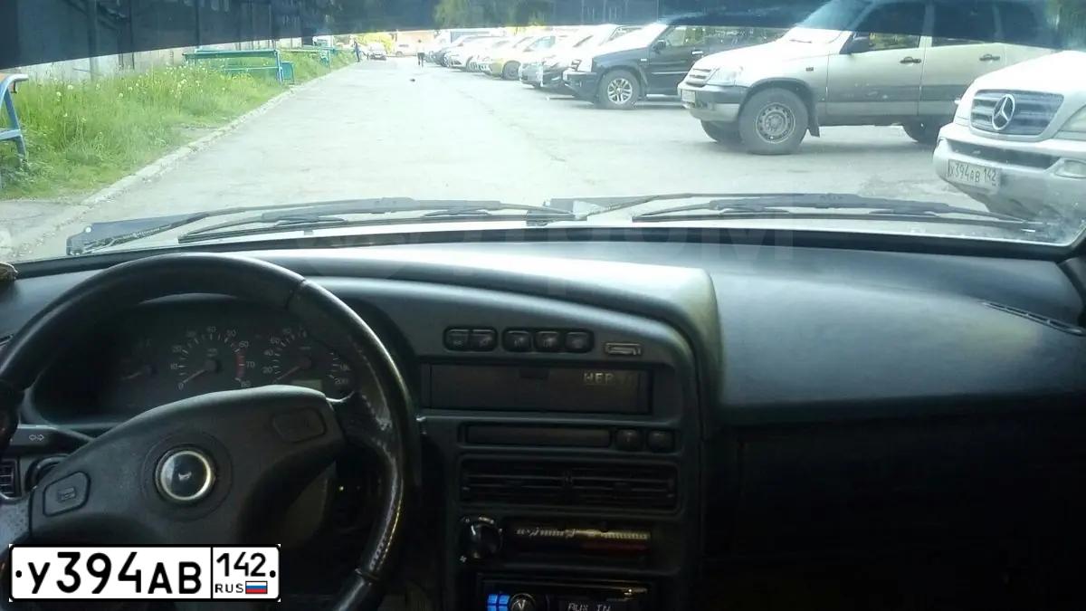 Фото автомобиля FORD FOCUS, 2007 — госномер У394АВ142. Цвет: Красный
