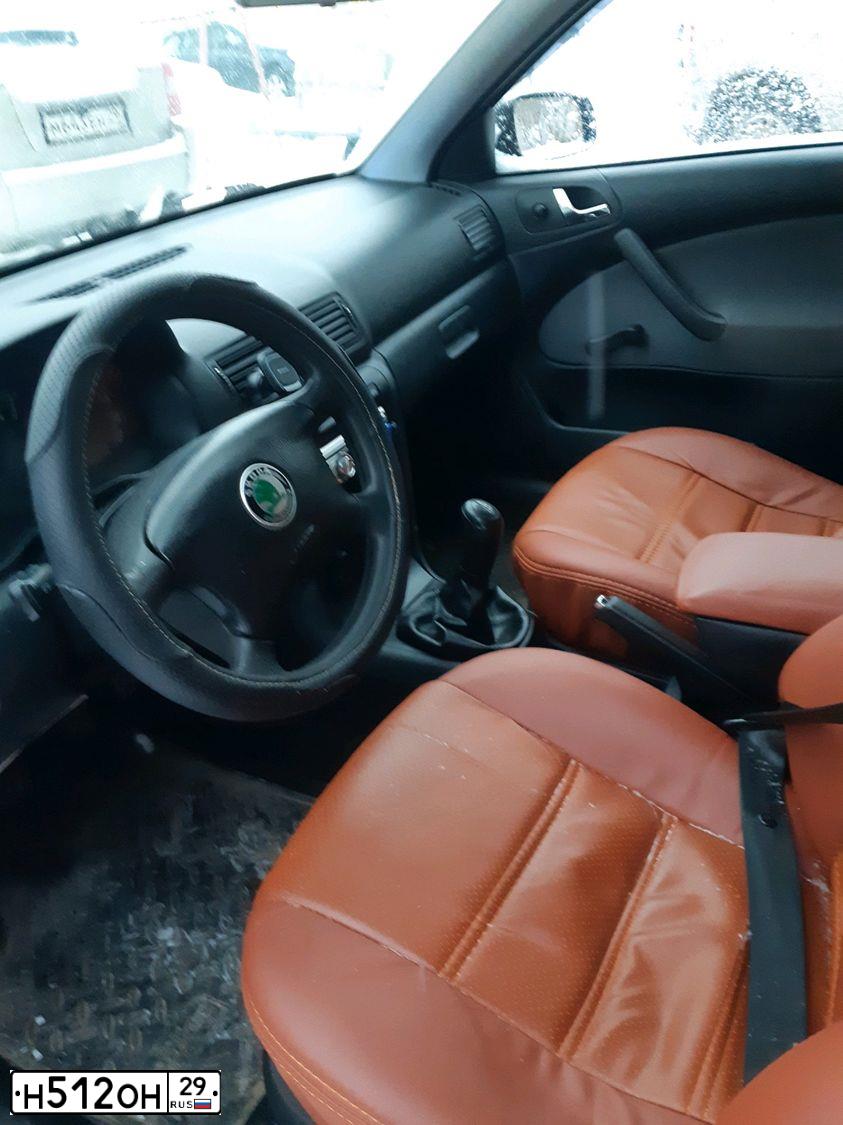 Фото автомобиля SKODA OCTAVIA, 2009 — госномер Н512ОН29. Цвет: ЧЕРНЫЙ