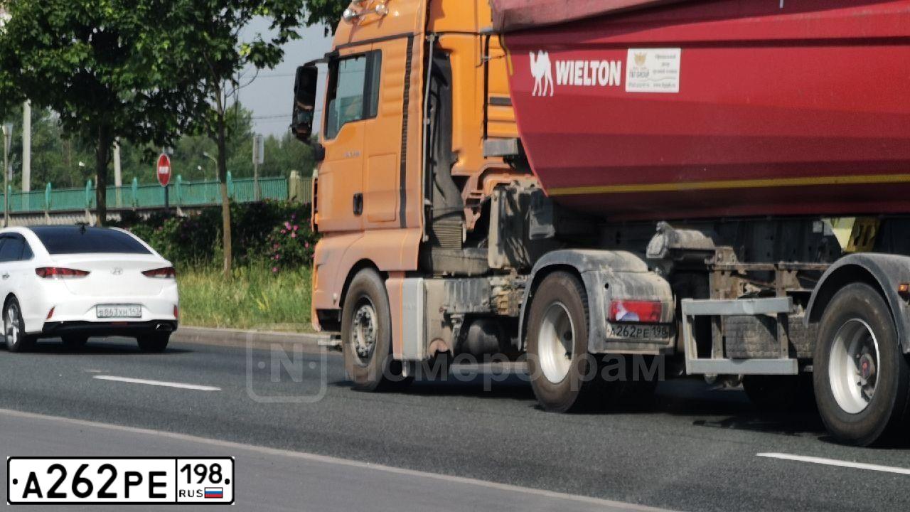 Фото автомобиля MAN TGX 18.XXX /4X2/, 2017 — госномер А262РЕ198. Цвет: Оранжевый