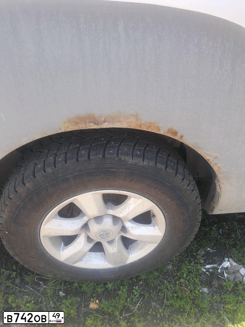 Фото автомобиля HYUNDAI GRAND STAREX, 2008 — госномер А549ВУ49. Цвет: Серый