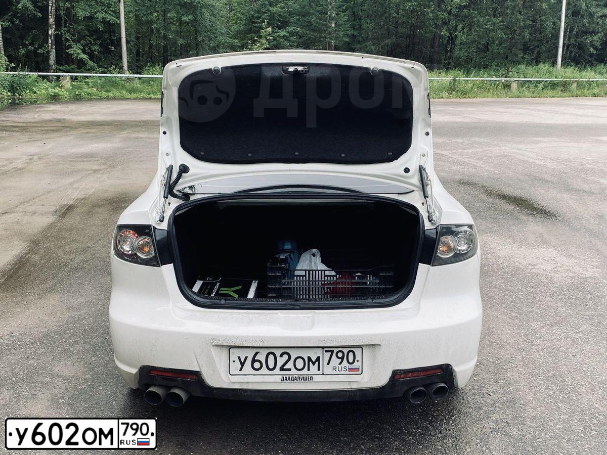 Фото автомобиля MAZDA 3, 2008 — госномер Н072КЕ199. Цвет: Белый