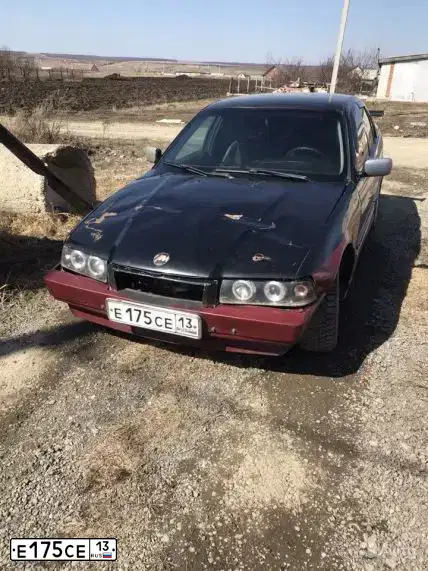 Фото автомобиля GEELY EMGRAND, 2014 — госномер Р068МК30. Цвет: СТАЛЬНОЙ (СЕРЫЙ)